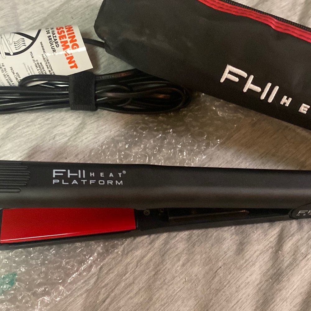 FHI HEAT Ceramic styling flat iron. Brand new